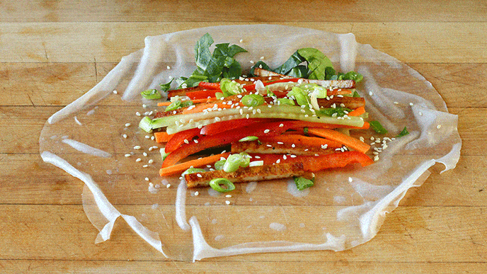 A GIF showing how to prepare and roll Vegan Rice Paper Rolls.