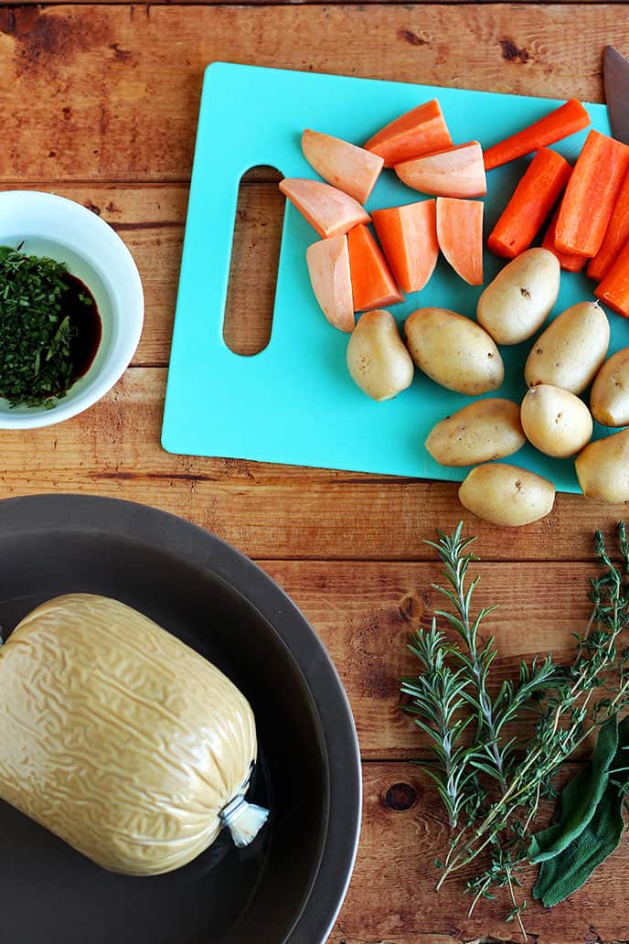 What you'll need to prepare a Tofurky roast: uncooked Tofurky roast, chopped vegetables, baste, and fresh herbs.