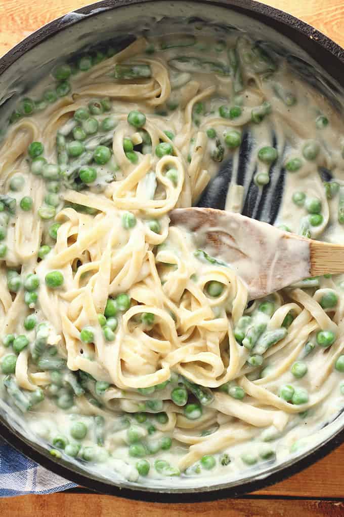 Vegan Garlic Alfredo with Peas & Asparagus - ilovevegan.com