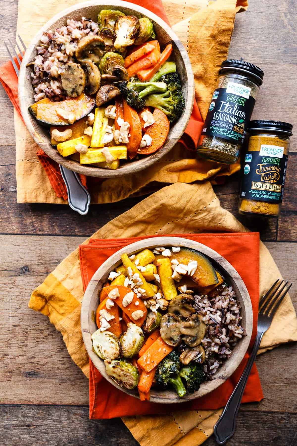 Roasted Fall Vegetable Bowls on a dark wood background.
