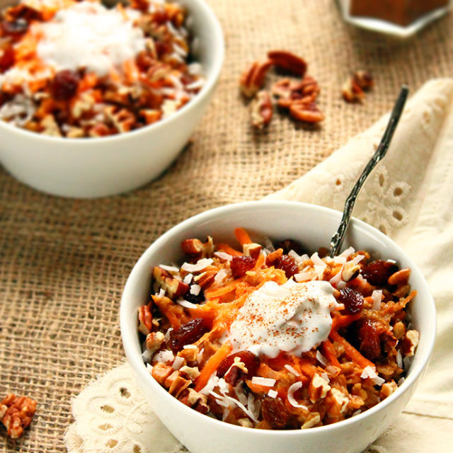 Spiced Carrot Cake Oatmeal with Coconut Cream {naturally sweetened!} via ilovevegan.com - A delectable dessert-worthy breakfast that's super simple and ready in under 15 minutes! Healthy eating staples are taken to a whole new level in this delicious breakfast. Think plump juicy raisins, crunchy pecans, flaked coconut, and traditional Fall spices like cinnamon and ginger - all naturally sweetened with soft caramel-y dates and real maple syrup. The perfect warming breakfast for a chilly Autumn morning! #vegan #glutenfree #soyfree #naturallysweetened #oatmeal